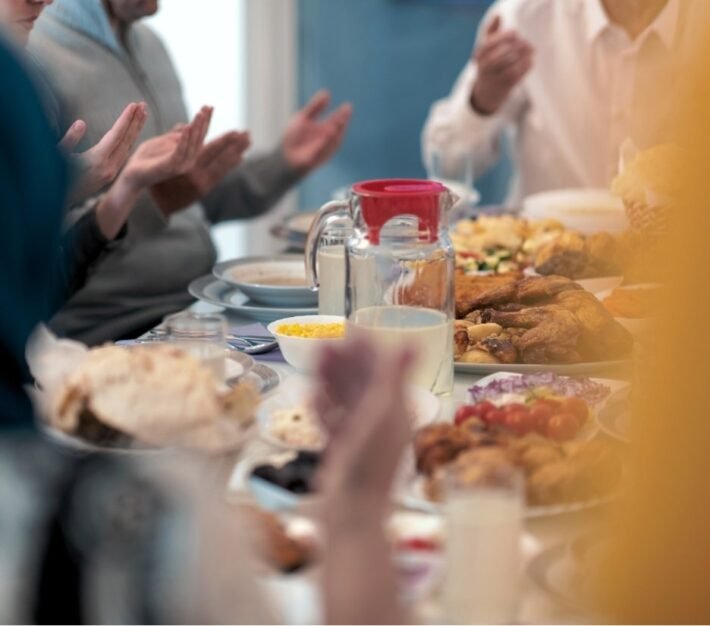 Family and friends gathered around an iftar table during Ramadan in Dubai