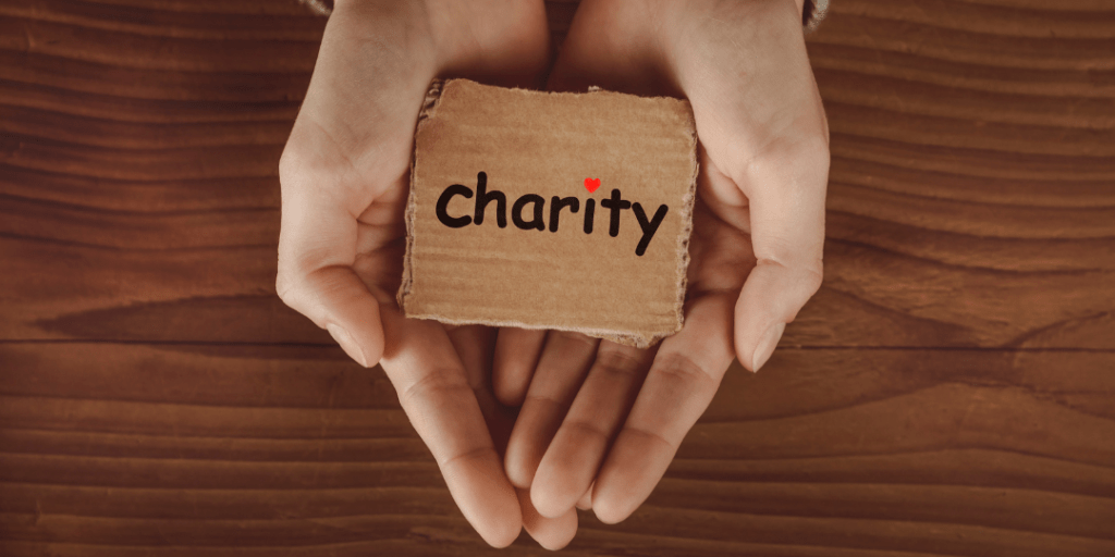 hand holding charity box